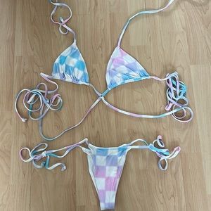 Brand new never worn Frankie’s tie dye bikini top and bottom. Both size small.